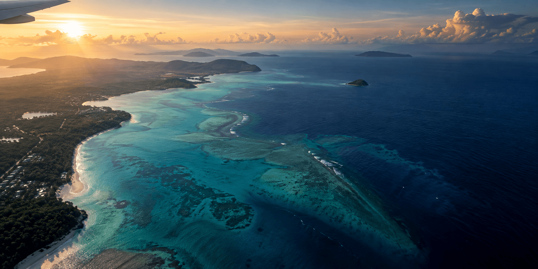 Aerial view of a tropical coastline and turquoise sea